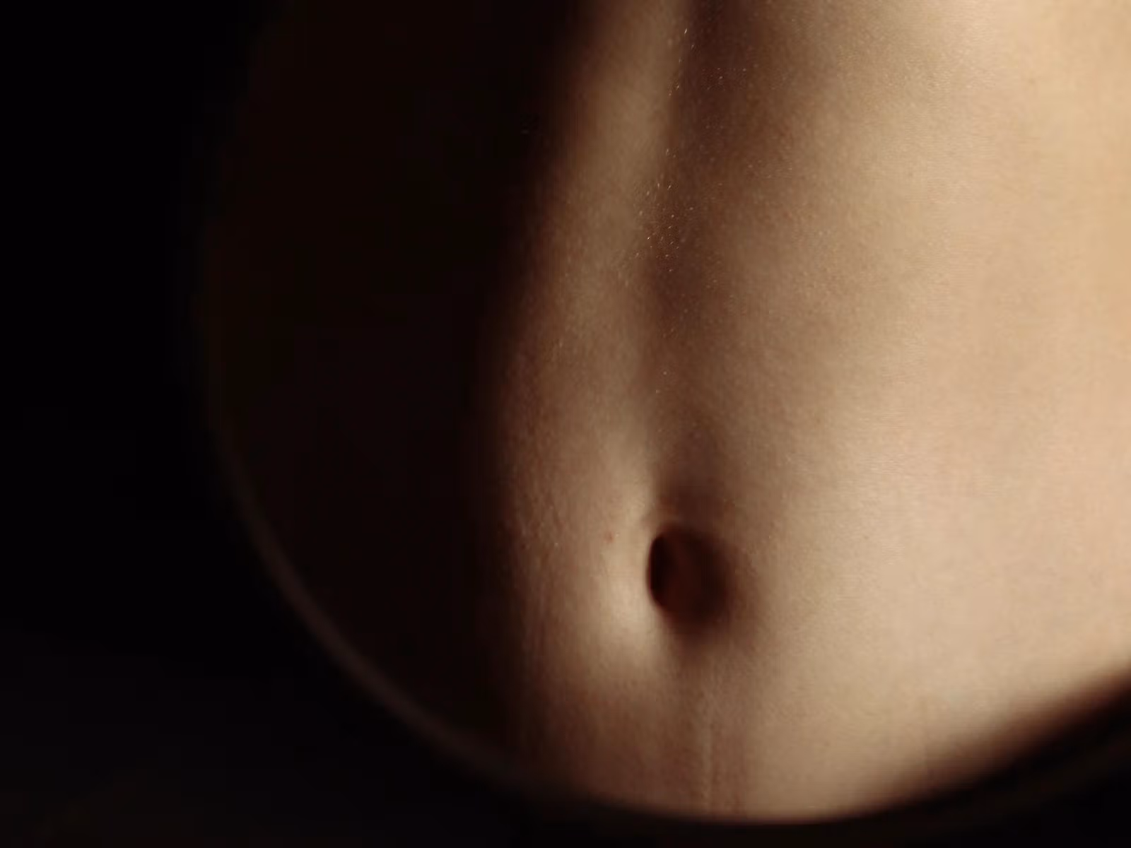 Close in image of person's stomach