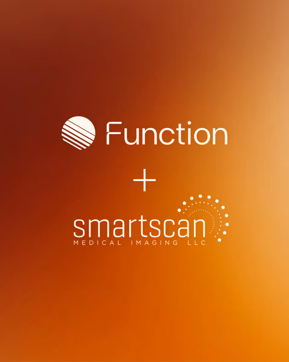 Function and Smart Scan logos on an orange gradient background.